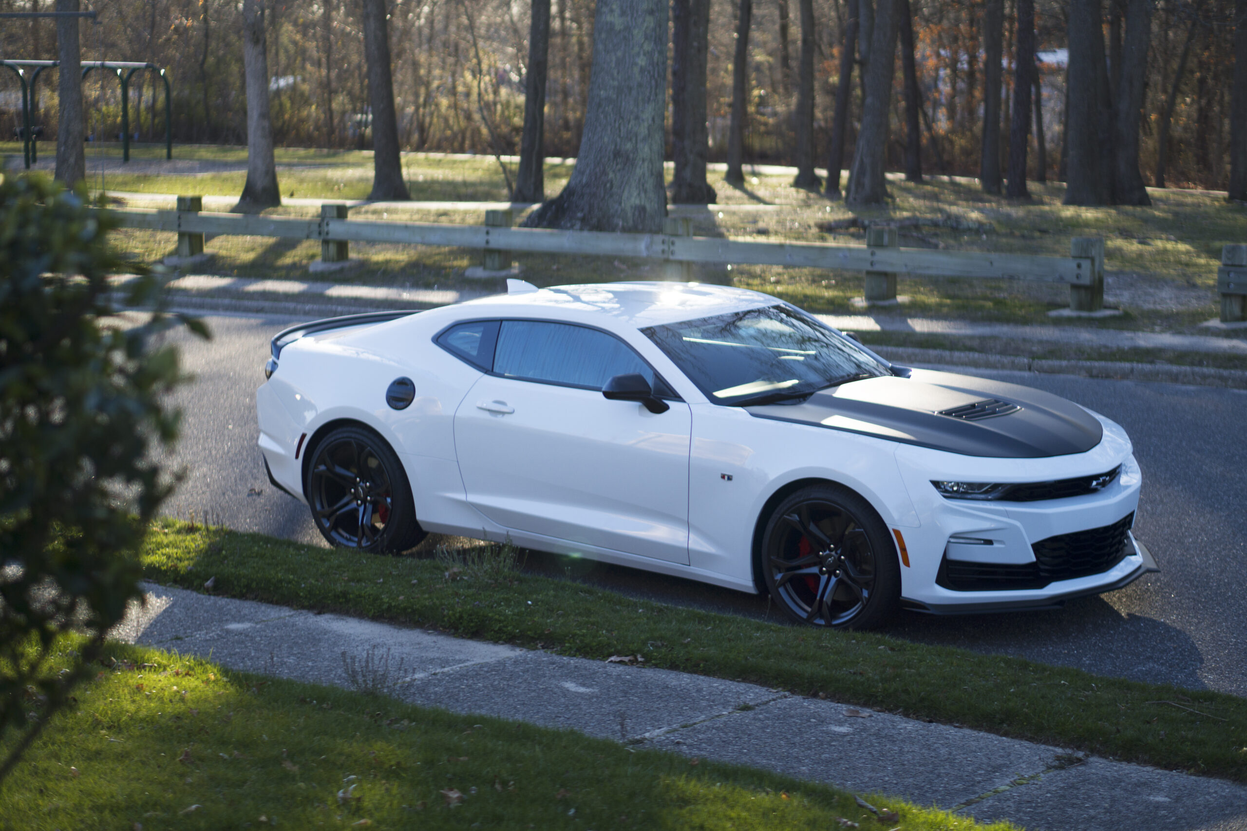 Glossy white Chevrolet Camaro after premium ceramic coating at Detail Sector, Saint James, NY