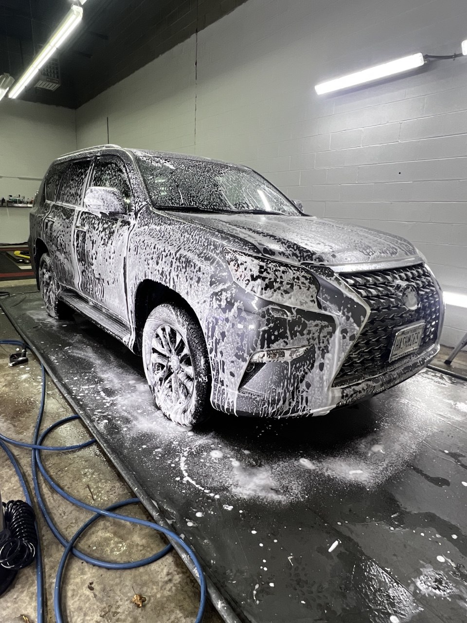Hand-wash membership service on SUV at Detail Sector